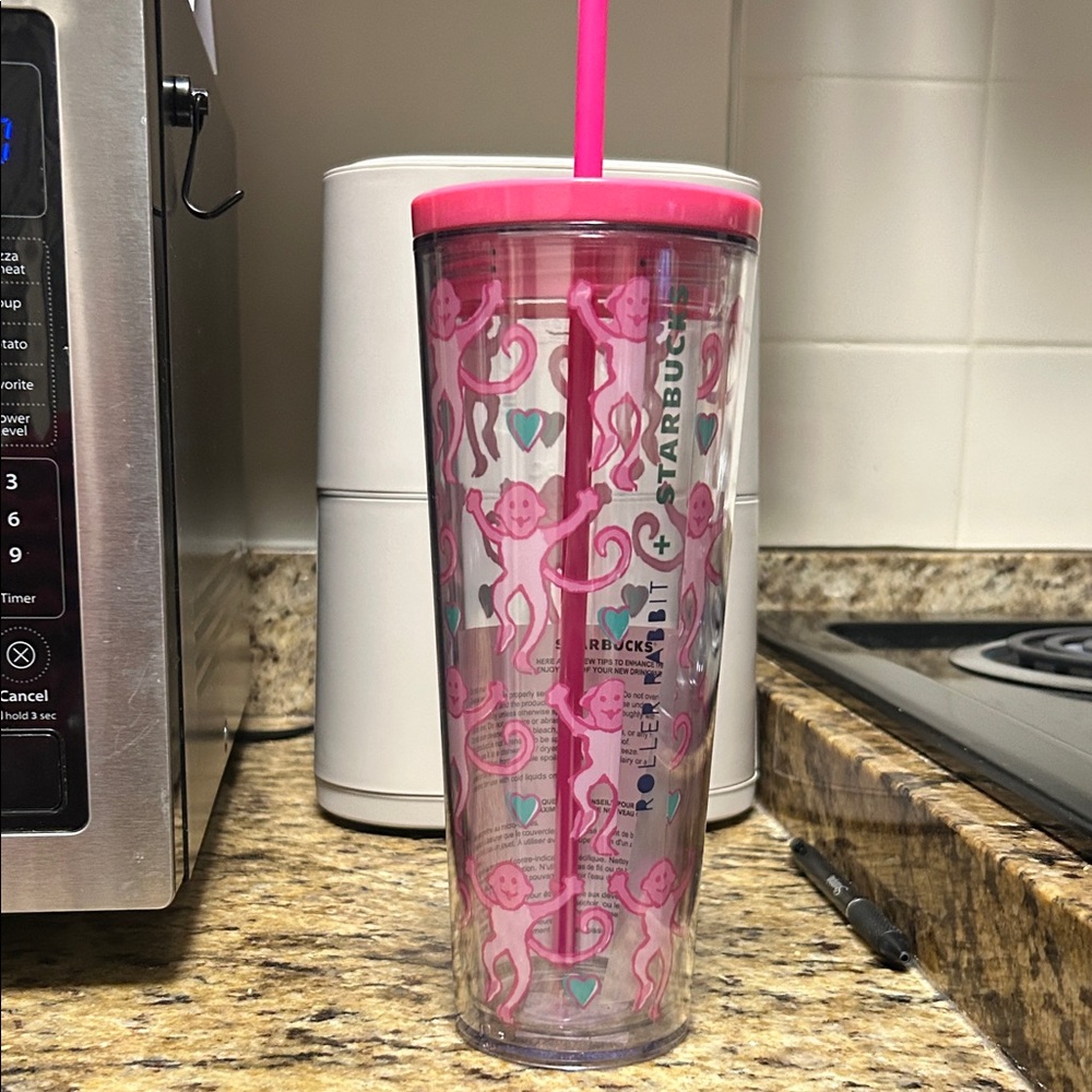 Roller Rabbit + Starbucks pink monkey tumbler with straw